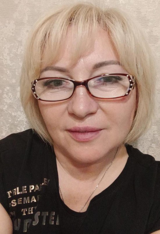 Olga • 54 • Moldova