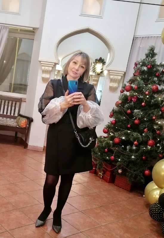 Olga • 51 • Russia