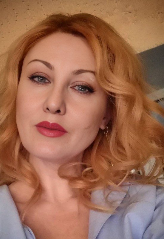 Olga • 48 • Russie