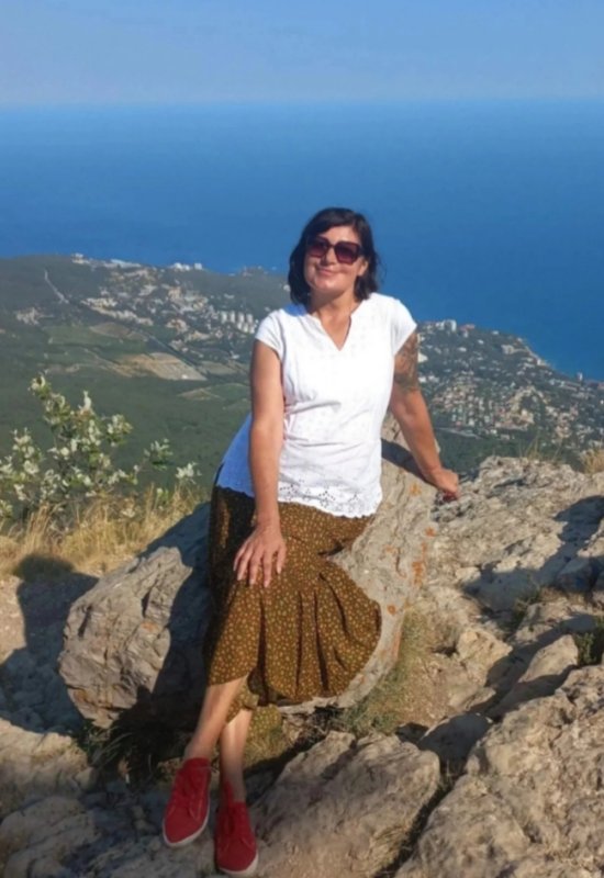 Elena • 49 • Austria