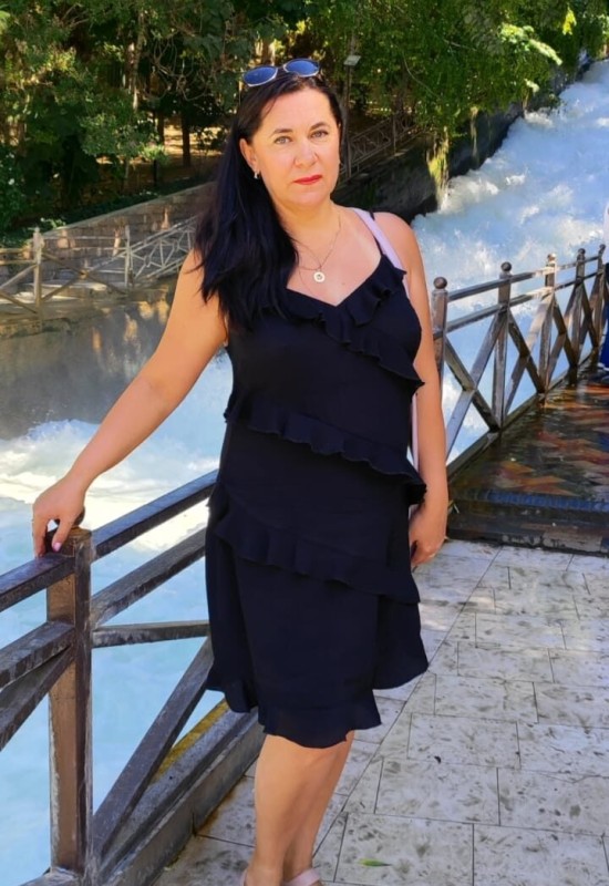 Olga • 50 • Russie